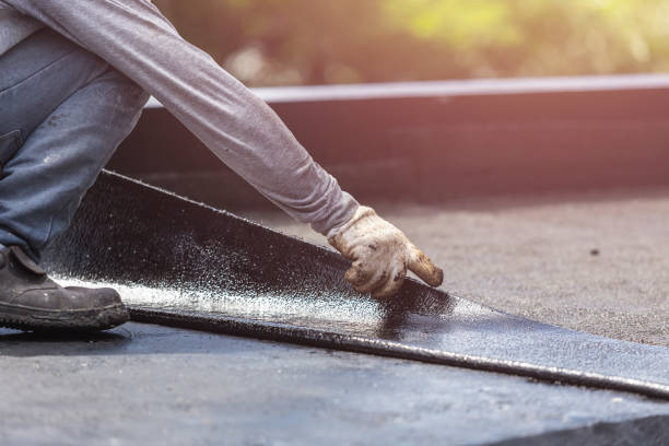 Professional Waterproofing technician working in Leonidas, MI